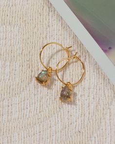 Harness the energizing power of gemstones with these hoop earrings! They create a surprisingly delicate aura, so airy and effortless, you won't even notice them! They look great worn singular or interspersed with larger hoops in your second piercing. Second Piercing, Tourmaline Stone, Watermelon Tourmaline, Labradorite Stone, 14kt Gold, Labradorite, Tourmaline, Aura, Hoop Earrings