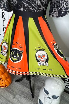 My very popular Halloween Treat design is now available in a skater skirt! This new color way is reminiscnet of vintage Halloween decorations in bright chartreuse green and orange. This flowy skirt is made from soft and smooth poly blend fabric with a bright print that will last for years. Elastic waistband and stretchy material that is super comfy. Shown here with our Tangled Web Victoria Top - purchase here. • 82% polyester, 18% spandex• Smooth fabric • Mid-thigh length • Elastic waistband Thi Retro Green A-line Skirt, Green Skirted Skirt For Fall, Green Fall Skirt, Green Skirt For Fall, Green Flowy Skirt For Fall, Vintage Green Flared Skirt Bottoms, Retro Green Skirt For Fall, Retro Green Skirted Bottoms, Mid Length Skirt