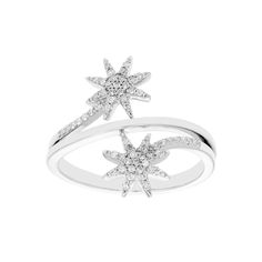 two white gold rings with diamonds on each one and an open star in the middle