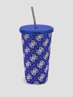 a blue and white cup with a straw in it