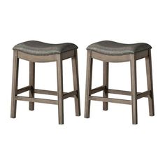 two stools with grey upholstered seat cushions