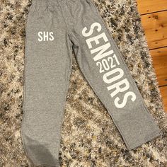 Super Soft Never Worn Gildab Sweatpants. But The Only Con Is They Have My High School Graduating Class On It. But As You Can See In The Picture The Fuzz Inside Isn’t Pilled Yet And Still Is Buttery Soft Gray Letter Print Pants For Loungewear, Senior Sweatpants, Senior Apparel, Senior Pants, Senior Ideas, Senior Photo Outfits, Senior Activities, Senior Photo, Senior Pics