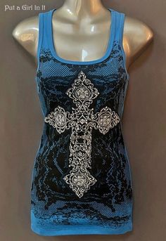 New Womens Vocal Apparel embellished cross blue sleeveless tank top Beautiful bright blue tank top embellished with stones. The front AND back are covered in stones. Stunning Color.  Black Lace Print Contrast on Front. Sold out with Vocal/Old School Style. Just GORGEOUS Made in USA by Vocal Apparel I have been selling Vocal clothing for 15 YEARS now and just LOVE this brand! 100% Cotton - Not alot of stretch in material Measured without stretching/Juniors Sized - *Small - 12" across chest - 26" Blue Cross, Lace Print, Blue Tank Top, School Fashion, Sleeveless Shirt, Sleeveless Tank Top, Tank Top Shirt, Black Lace, Womens Clothing Tops