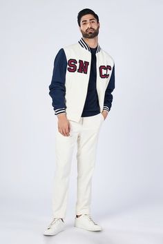 Shop for S&N by Shantnu Nikhil Off White Cotton Colorblock Varsity Jacket for Men Online at Aza Fashions White Cotton Outerwear With Striped Cuffs, Sporty White Outerwear With Striped Cuffs, Spring White Outerwear With Contrast Stripes, White Fall Outerwear With Striped Cuffs, White Track Jacket With Contrast Stripes For Winter, White Casual Track Jacket With Contrast Panels, White Varsity Jacket For Winter Workwear, White Cotton Outerwear With Ribbed Cuffs, Casual White Track Jacket With Contrast Panels