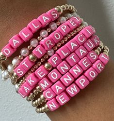 Say hello to our brand-new Destination Bracelets. These babies are all about fun and flaunting, dipped in hot pink color that's impossible to miss. Each bracelet rocks the names of our top-pick city spots and resort destinations.
This bracelets will not tarnish and you can wear this in the pool or sea.
3mm beads | Available in 6.5" or 9.5" (stretchy)
Please note that each piece is custom made with your city names and final sale. Cheap Pink Statement Name Bracelet, Cheap Playful Pink Name Bracelet, Pink Name Bracelet For Friendship, Everyday Pink Beaded Name Bracelet, Adjustable Pink Stackable Friendship Bracelets, Adjustable Stackable Pink Friendship Bracelets, Custom Name Pink Jewelry For Everyday, Adjustable Pink Friendship Bracelets With Custom Name, Custom Name Pink Adjustable Bracelets