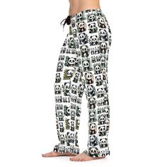 Wrap yourself in cozy comfort with our women's pajama pants, adorned with an adorable design featuring a group of baby pandas engaged in various cute activities. The pajama pants showcase a delightful full image of these playful pandas on both the front and back, making each pair a charming addition to your loungewear collection. Crafted from 100% polyester, these pants are designed for ultimate comfort while you relax. The elastic waistband at the back and adjustable black drawstring ensure a perfect fit, while the care label indicates that these pants are proudly sewn and assembled in the USA from parts sourced globally. Product Details: *Material: Made from 100% polyester, these pajama pants offer a soft, smooth feel against the skin, perfect for lounging at home or enjoying a restful n Cute Sleepwear With Elastic Waistband For Loungewear, White Cotton Home Bottoms, Super Soft Cotton Sleepwear, Casual Super Soft Sleepwear For Bedtime, Super Soft Comfortable Cotton Sleepwear, Cozy Cotton Sleep Pants, Cute Cotton Bedtime Pants, Cozy Sleepwear With Elastic Waistband For Sleepovers, Casual Super Soft White Sleepwear