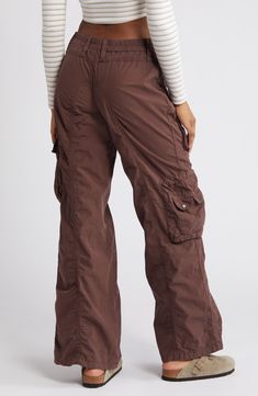 Tap into the retro look you missed the first time around in these all-cotton cargo pants featuring commodious bellows pockets to hold most everything you need. Exclusive retailer 31" inseam; 23 1/2" leg opening; 9 1/2" front rise; 13 1/2" back rise (size Medium) Back elastic waist 100% cotton Machine wash, line dry Made in Turkey Baggy Cargo Pants For Women, Y2k Parachute Pants With Pockets For Fall, Y2k Pants With Side Pockets For Fall, Y2k Fall Pants With Side Pockets, Y2k Style Fall Pants With Side Pockets, Wide Leg Cargo Jeans With Multiple Pockets For Outdoor, Y2k Fall Cargo Pants With Pockets, Y2k Cargo Style Bottoms For Fall, Wide Leg Cargo Jeans For Outdoor Activities