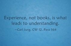 a blue background with a quote from carl jung on the book experience, not books, is what leads to underhanding