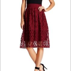 Details: * Elasticized Waist * Allover Cutout Lace Design * Hidden Zip Closure * Fully Lined * Approx. 27" Length * Shell/Lining: 100% Polyester * Care: Hand Wash * Color: Burgundy Red Formal Skirt For Summer, Red Midi Lined Skirt, Red Lined Midi Skirt, Red Midi Skirt With Lining, Red Flowy Skirt For Formal Occasions, Red Formal Flowy Skirt, Elegant Red Knee-length Skirt, Formal Red Flowy Skirt, Red A-line Skirt For Formal Occasions