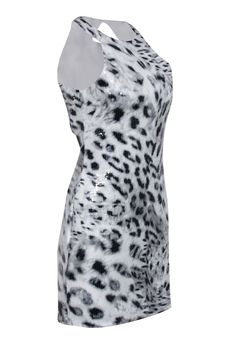 Get wild and sparkly in this Parker sequin grey and white leopard print dress. With a high neck and cut out back detail, this sleeveless dress is perfect for a girls' night out in Vegas or a bachelorette party in Miami. Style it with strappy heels for a fun and fearless look. Size M Shell 95% Polyester, 5% Spandex Lining 97% Polyester, 3% Spandex Invisible side zipper Cut out back details Sleeveless High neckline Bust 34" Waist 28" Shoulder to hem 34" Summer Sequin Mini Dress With Stretch, Summer Stretch Mini Sequin Dress, Glamorous Stretch Sequin Summer Dress, Summer Mini Sequin Dress With Stretch, Summer Mini Length Stretch Sequin Dress, Summer Sleeveless Mini Dress With Contrast Sequin, Chic Stretch Sequin Sleeveless Dress, Summer Sleeveless Contrast Sequin Mini Dress, Chic Stretch Sleeveless Sequin Dress