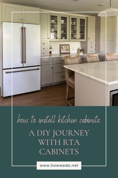 the kitchen cabinets are all white and there is a large island in front of it