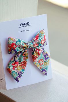 Liberty London Hair Bow Girls Hair Clip Liberty of London | Etsy Sew Fabric Bows, Sewn Hair Accessories, Hair Bow Packaging, Hair Clip Packaging, London Hair, Fabric Hair Bow, Girls Hair Bows Diy, Bow Fabric, Sailor Bow