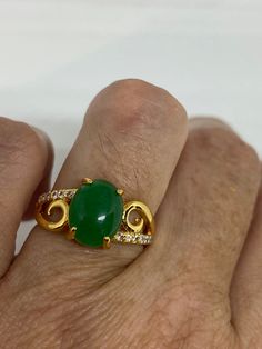 Vintage Lucky Green Nephrite Jade ring Fun jade is color enhanced Large green nephrite jade Ornate German Gold finished Vintage ring, does not tarnish, NOT sterling Size 6.5, 7 or 9 All rings are shipped free in the US in a nice gift box. Check out our over a THOUSAND great reviews Engraving is $4 per letter and is not always perfect depending on the piece. It can take a few days if the jeweler is busy. This is payable to Paypal Judithsltd@gmail.com Green Jade Spiritual Rings, Spiritual Green Jade Rings, Spiritual Jade Gemstone Rings, Green Emerald Spiritual Ring For Anniversary, Green Emerald Ring For Anniversary, Green Oval Jade Ring, Green Jade Anniversary Rings, Quartz Choker, Pretty Accessories