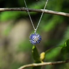 The Aster flower represents the birth month of September, 20th Wedding Anniversary, love, patience and makes a special gift. Aster blue hand enamelled rhodium tone pendant necklace. Designed by us, at our London office. Presented on a gift card (as shown). Our beautiful pendant embodies nature with its intricate design and attention to detail. The pendant is on a 41cm chain, with 7.5cm extension chain and lobster clasp. Matching earring and brooch available. This is just one design from a range of classic flower jewellery. Please do take a look at our other styles. All our products conform to EU directives on safety. Blue Enamel Necklace For Anniversary, Blue Sterling Silver Birth Flower Jewelry, Blue Sterling Silver Jewelry With Birth Flower, Blue Sterling Silver Necklace With Flower Charm, Blue Birthstone Jewelry For Mom, Blue Jewelry For Mother's Day Gift, Blue Birthstone Jewelry Gift For Mom, Blue Jewelry For Birthday Gift And Mother's Day, Blue Jewelry Gift For Mother's Day