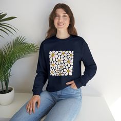 Everyone loves a comfy sweatshirt in the fall. Check out this adorable funky print and let that inner babbs turn outter ;) Check out the cute little flower on the left sleeve 🌼 .: 50% cotton, 50% polyester.: Medium-heavy fabric (8.0 oz/yd² (271.25 g/m²)).: Loose fit.: Sewn-in label.: Runs true to size Trendy Spring Sweatshirt For Loungewear, Cozy Long Sleeve Sweatshirt For Spring, Trendy Spring Loungewear Sweatshirt, Trendy Floral Print Crew Neck Sweater, Graphic Print Sweatshirt For Spring Loungewear, Cute Long Sleeve Spring Sweatshirt, Cozy Crew Neck Sweatshirt For Spring, Cute Sweatshirt For Spring Loungewear, Winter Floral Print Cotton Tops