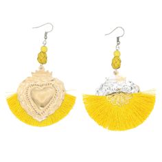 Mariposas Milagro Heart Tassel Drop Earrings Handmade in Oaxaca, Mexico With these cute Milagro Heart Earrings, you can give your outfit the Mexican flair you've been seeking for! A distinctive statement piece with intricate features, like the tassel emerging from milagro-typical symbols like the sacred heart. Ideal for someone who likes Mexican traditional art!Only a stylish person would wear these 100% handcrafted Mexican earrings with their exquisite pattern made of lightweight aluminum for a Milagro Heart, Heart Tassel, Mexican Earrings, The Sacred Heart, Pink Tassel, Tassel Drop Earrings, Cute Heart, Sacred Heart, Tassel Earrings