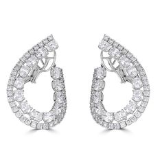 These exquisite 18kt white gold earrings showcase 9.69cts of oval and round diamonds in an elaborate loop pattern. Handcrafted in Italy by ZYDO Italian Jewelry. Diamond Quality: Color F, Clarity VSDiamond Carat Weight: 9.69Dimension: 1 1/2 in. x 1 1/16 in. Italian Jewelry, Loop Earrings, White Gold Earrings, Jewelry Diamond, Round Earrings, Oval Diamond, Huggies Earrings, Round Diamonds, Gold Earrings