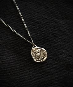 This necklace is composed of an ancient greek spinner coin pendant in silver filled brass, a  durable and fashionable piece that compliments any outfit. Perfect gift for him! The pendant is also double sided as seen in the pictures. About the coin: The owl represents prosperity and pride of Ancient Greece. It also is the emblem of the city of Athens. Above all, it was the first widely recognized international coin in classical antiquity. This historical coin depicts the helmeted head of Athena o Owl Of Athena, Historical Coins, Greek Mythology Jewelry, Pendant Necklace Men, Mythology Jewelry, Silver Coin Necklace, Grece Antique, Classical Antiquity, Perfect Gift For Him