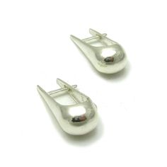 Sterling silver earrings. Stamped 925. Approximate weight 6.7 grams. Dimensions 2.5x0.9cm (1.00x0.36 inches). All our jewels are made from solid sterling silver 925/1000 and are carefully crafted by hand in our family workshop. We dispatch your orders in 5 working days, worldwide and the postage is $5. We ship registered priority mail. Please allow 5-7 working days for delivery in Europe and 10-15 working days outside Europe. For any questions - please do not hesitate to contact me! Sterling Silver Teardrop Huggie Earrings For Formal Occasions, Formal Teardrop Sterling Silver Huggie Earrings, Sterling Silver Clip-on Earrings With Polished White Gold Finish, Classic Silver Pierced Huggie Earrings, Classic Silver Huggie Pierced Earrings, Classic Sterling Silver Earrings With Polished Finish, Modern Sterling Silver Teardrop Huggie Earrings, Modern Teardrop Sterling Silver Huggie Earrings, Modern Silver Teardrop Huggie Earrings