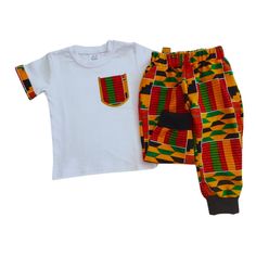 Cute, comfy pants in beautiful African print fabric + a t-shirt with matching fabric.  The pants have a comfortable elastic waistband, front pockets, and ribbed elastic ankles. These are jogger style pants, comfortable and fit great. We can make the pants in several fabric options, check the listing photos for high quality African print fabric options.  The t-shirt has matching African print fabric added to the sleeves, and also a pocket in the same fabric embroidered to the front. Baby sizes ha Casual Printed Cotton Sets, Cotton Sets With Elastic Waistband And Short Sleeves, Multicolor Matching Short Sleeve Pant Set, Casual Multicolor Printed Pant Set, Multicolor Short Sleeve Matching Pant Set, Multicolor Matching Pant Set, Casual Cotton Sets With Elastic Waistband, Casual Cotton Pant Set, Casual Relaxed Fit Cotton Pant Set