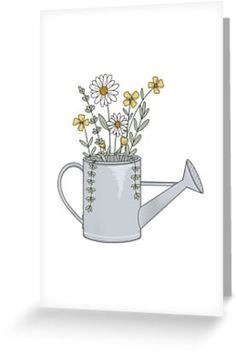 a watering can with flowers in it