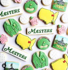 decorated cookies with the words masters and images of golf players are displayed on a white surface