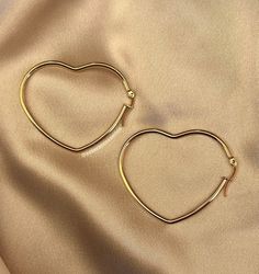 These heart hoops are simple but add a lot of pizzazz to your outfit! Perfect for a night out on the town!  *2 inch diameter  *Hinged clasp I ship within 1-3 buisness days!  Thank you so much for all your support! ❤️  -EsserAccessories Gold Hoop Earrings For Valentine's Day Party, Trendy Heart Hoop Earrings For Party, Trendy Heart-shaped Hoop Earrings For Party, Trendy Small Hoop Jewelry For Valentine's Day, Hoop Earrings For Valentine's Day Party, Party Hoop Heart Earrings For Pierced Ears, Party Hoop Heart Earrings, Valentine's Day Hoop Earrings For Party, Trendy Heart Charm Hoop Earrings