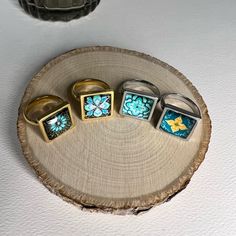 Description: Boho Chic Mandala Square Rings These Items Are Individually Made With Love By Us. Details: Handmade Materials: Stainless Steel & Resin Main Color: Blue, Green, Yellow & Silver/Gold Diameter:7" Style: Mandala / Boho Chic / Artsy / Classic Ring 1 - Gold W/ Small Flower Ring 2 - Gold W/ Large Flower Ring 3 - Silver W/ Blue Mndala Ring 4 - Silver W/ Blue & Yellow Flower ***Check 3rd Picture To See The Numbers*** Care Instructions: Store Out Of Direct Sunlight And Keep Away From Water. I Turquoise Open Ring Jewelry As Gift, Turquoise Open Ring Jewelry For Gifts, Metal Flower Ring Gift, Unique Blue Flower Ring For Gift, Blue Flower Ring For Gift, Handmade Blue Metal Rings, Nickel Free Metal Rings For Gifts, Unique Nickel-free Flower Ring As Gift, Unique Nickel-free Flower Ring For Gift