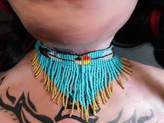 Artisan Turquoise Necklace With Colorful Beads For Festivals, Turquoise Choker With Colorful Beads, Adjustable Gold Turquoise Beaded Necklace, Handmade Turquoise Choker For Festivals, Handmade Turquoise Choker Necklace, Adjustable Gold Turquoise Necklace With Colorful Beads, Bohemian Turquoise Choker With Tiny Beads, Gold Beaded Necklace For Festival, Unique Beaded Fringe Jewelry For Festivals