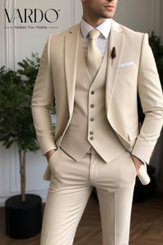 Suits for men, Beige men's Suit, 3 Piece suit, party wear suit, Fashionable suit for men, Prom suit , men elegant suit Elevate your wardrobe with our timeless and sophisticated Classic Beige Three-Piece Suit for men. This meticulously tailored ensemble is designed to bring out your best in every formal or semi-formal occasion. Crafted from high-quality materials, this beige three-piece suit exudes both comfort and confidence. The versatile color allows for effortless pairing with a range of shirts and accessories, making it an essential addition to your collection. The jacket features a notch lapel, adding a touch of classic elegance. The tailored trousers and waistcoat complete the ensemble, offering a polished look that stands the test of time. Whether you're attending a business meeting Prom Suit Men, Beige Suits, Mens Fashion Blazer, Suit For Men, Designer Suits For Men, The Rising Sun