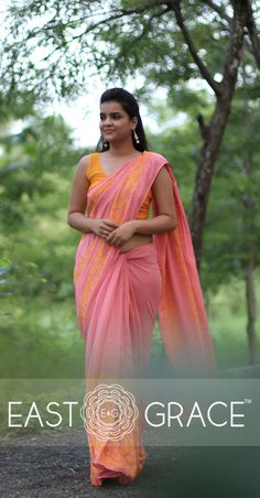 Featuring a coral pure georgette saree from EAST & GRACE with orange gingko leaf rows on pallu and skirt of the saree. It comes with an unstitched orange sleeveless blouse. Visit www.eastandgrace.com. Price: RS.13,000. Gorgeous Outfits, Designer Wall, Dress Indian, Dress Indian Style