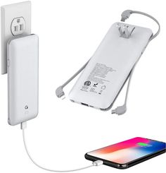 an iphone charger and power strip attached to a wall