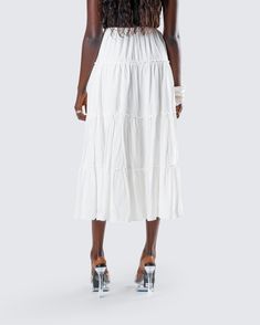 You’ll always be top tier in this white tiered maxi skirt 👑 Made from viscose challis fabric and featuring an elastic waistband and A-line design - this piece is the perfect closet staple to pair with everything 🤍 Flowy Ruffle Midi Dress, Spring Relaxed Fit Tiered Maxi Dress, Chic Midi Dress With Ruffles, Beach Tiered Ruffled Maxi Skirt, Spring Tiered Maxi Dress With Gathered Skirt, Chic Tiered Maxi Skirt For Summer, Beach Tiered Maxi Skirt With Ruffled Details, Tiered Dress With Lined Skirt, Flowy Tiered Dress With Lined Skirt