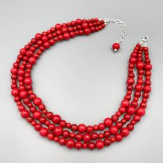 "This a beautiful Red Turquoise Chunky Necklace is completely handmade with high quality. This gorgeous Red Turquoise Chunky Necklace goes with everything and everywhere, holiday party or after work with friends! The Necklace made from Red Turquoise beads, 16\" short layer and 18\" long layer with 3 inch extender chain for adjustment, and has light weight. Stone meaning Turquoise is perhaps the oldest stone in man's history, the talisman of kings, shamans, and warriors. Red Turquoise is a stone Handmade Red Beaded Necklace For Holidays, Red Coral Beaded Necklace With Wooden Beads, Red Multi-strand Necklace With Wooden Beads, Gift Jewelry With Wooden Beads And Red Coral, Multi-strand Red Coral Beaded Necklace As Gift, Multi-strand Necklace With Red Wooden Beads, Multi-strand Red Coral Beaded Necklace For Gift, Multi-strand Red Necklace With Wooden Beads, Red Wooden Beads Jewelry As A Gift