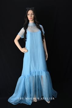 Elevate your wardrobe with our Women's Blue Long Organza Dress, a stunning blend of elegance and boho charm, perfect for special occasions and summer weddings. Feel the lightness of the organza fabric as it flows gracefully with every step. Key Features: - Beautiful blue organza fabric for a dreamy look - Flattering long design, ideal for various body types - Boho style with delicate details that stand out - Perfect for weddings, parties, or any special event Crafted with care, this dress ensures comfort without compromising style. Our sizing options cater to all, and we offer customization to make it uniquely yours. Made with sustainable practices, it's an eco-friendly choice you can feel good about. Dress concerns? Our customers love the soft feel and breathability. Plus, it's easy to ca Blue Organza Gown For Spring, Flowy Organza Maxi Dress, Sheer Light Blue Dress, Bohemian Organza Summer Dress, Summer Bohemian Organza Dress, Blue Floor-length Summer Evening Dress, Summer Floor-length Organza Gown, Blue Flowy Gown For Party, Blue Sheer Dress For Wedding