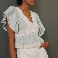 Nwt!! Never Been Worn! Description: V Neck Short Ruffle Sleeves Crochet Lace On Top Eyelet Embroidery On Top Measurements/Item Details Size - Small Bust - 18" Across (Laying Flat) Length - 19.5" Approx Color - Sky Fabric - Cotton Please Note: This Item Is New With Tags. Cute V-neck Top With Lace Trim, Fitted Ruffle Crochet Top, Spring Lace Tops With Puff Sleeves, Cottagecore V-neck Tops For Spring, Chic Lace Patchwork Tops For Spring, Summer Lace Blouse With Puff Sleeves, Cute Lace Trim Top, Spring Puff Sleeve Top With Lace Patchwork, Feminine Cotton Tops With Lace Patchwork