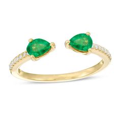 Celebrate her May birthday in style with this sparkling gemstone ring. Crafted in warm 14K gold, this dazzling treat features a 5.0 x 4.0mm pear-shaped verdant-green emerald on either side of the clever open-shank design. Ribbons of petite diamond accents line the ring's slender shank. Polished to a bright shine, this look is the perfect anytime choice. Harlem Nights, Verdant Green, Emerald Rings, Nature Inspired Rings, Diamond Cluster Engagement Ring, Sterling Silver Jewelry Rings, May Birthday, Gold Bullion, Emerald Jewelry