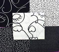 black and white fabric with different designs on it