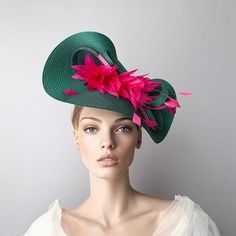 This fascinate hat is perfect for the Kentucky derby, Ascot races, weddings,  Belmont or Preak Hat or  any special occasion.The base measures 14" across and is held on by a thin black headband (with silicone ends to prevent a headache) and small comb. If you can custom the colours, the side to wear it or have any special questions please, contact me.* Follow this link for more beautiful choices from 'Sophie Young Hats' https://www.etsy.com/shop/sophieyounghats Derby Hats Diy Ideas, Hat Feathers, Feathers Wedding, Kentucky Derby Style, Green Fascinator, Ascot Races, Kentucky Derby Fascinator, Blue Fascinator, Royal Ascot Hats