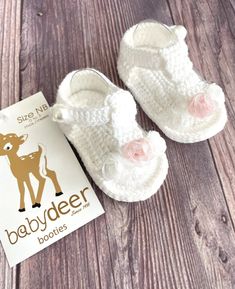 Adorable white crocheted T-strap sandal with flower accents on the open toe, pearl closure. From Baby Deer. Size Newborn, 0-3 Months. Approx 3.25" from heel to toe. 100% Cotton, hand crocheted. Preemie Boy, Crib Shoes Girl, Deer Girl, Newborn Girls, Baby Dedication, Flower Sandals, Baby Deer, Girls Sandals, Crib Shoes