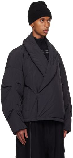 RDS-certified down-filled and lightweight nylon taffeta jacket. Water-repellent. · Shawl collar · Magnetic fastening at double-breasted press-stud closure · Welt pockets · Drawstring at hem · Dropped shoulders · Elasticized cuffs · Welt pocket at interior · Full recycled polyester sateen lining Supplier color: Black cloud Fill: 90% white duck down, 10% feather. Taffeta Jacket, Black Clouds, White Duck, White Ducks, Duck Down, Press Studs, Shawl Collar, Welt Pockets, Welt Pocket