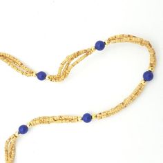 Short sections of three strands of tulsi beads separated by gold colored beads and Lapis beads.Length: 16" when open.The necklace makes one round around the neck. Mist Diffuser, Prayer Shawl, Mala Beads, Semiprecious Stones, Rope Bracelet, Precious Stones, Semi Precious, Gold Color, Hand Carved