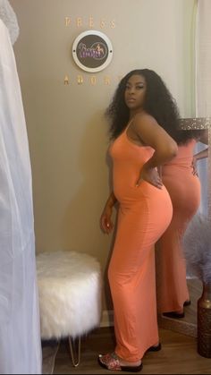 Peach colored fitting maxi dress Bodycon Maxi Dress For Summer, Spring Stretch Maxi Dress, Sleeveless Apricot Maxi Dress For Party, Spring Stretch Maternity Maxi Dress, Apricot Maxi Party Dress, Stretch Orange Maxi Dress For Party, Pink Floor-length Maxi Sundress, Apricot Fitted Maxi Dress For Party, Solid Full Length Spring Dresses