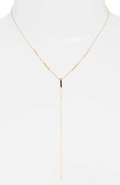 Solid bars add dimension to this golden chain Y-necklace anchored with a slender pendant. 15" length; 7" drop Stainless steel Imported Chic Long Drop Gold Necklace, Gold Long Drop Necklace With Adjustable Length, Dainty Gold-tone Lariat Necklace With Clavicle Chain, Minimalist Gold-tone Lariat Necklace With Delicate Chain, Minimalist Gold-tone Lariat Necklace With Adjustable Chain, Gold-tone Minimalist Lariat Necklace With Adjustable Chain, Gold Y-shape Clavicle Chain Necklace, Chic Long Drop Necklace With Delicate Chain, Gold Y-shape Drop Necklace With Delicate Chain