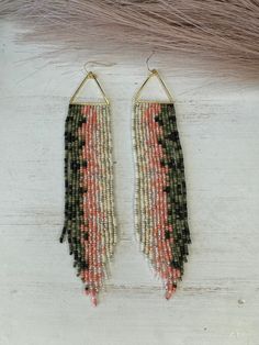 Hand beaded glass bead earrings. Hypoallergenic Hooks. Quarter placed for size reference. 5 3/4 of an inch from top of triangle to the longest point. Desert Beaded Earrings, Adjustable Triangle Beaded Earrings, Adjustable Triangle Beaded Jewelry, Adjustable Triangular Beaded Jewelry, Bohemian Triangle Beaded Earrings, Bohemian Triangle Jewelry With Dangling Beads, Trout Earrings, Fall Bead, Fringe Earring