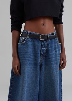 Color: Dark Blue Midweight woven cotton denim Oversized fit Exaggerated wide leg Half elasticated waistband Slant hip pockets Back patch pockets Front button closure Zip fly Unlined 100% Cotton Machine Wash Cold By The Frankie Shop. Imported *Belt is for styling purposes only Denim Blue Bottoms With Belt, High Waist Denim Bottoms With Belt, Medium Wash Straight Leg Jeans With Belt, Casual Denim Bottoms With Belt, Straight Leg Denim Blue Belted Jeans, Belted Straight Leg Denim Blue Jeans, Denim Blue Belted Straight Leg Jeans, Medium Wash Belted Straight Leg Bottoms, Belted Wide Leg Denim Jeans