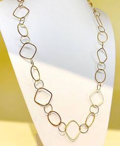 Everyday Gold Loop Long Necklace: a fusion of modern design and timeless allure. Crafted with precision from premium stainless steel and bathed in a luxurious gold plating, this necklace offers a contemporary open-link style that exudes both simplicity and sophistication. Its adjustable longer-length ensures the perfect drape for every neckline, while the sturdy lobster clasp ensures a secure fit. Whether worn as a single long strand or wrapped around for a dynamic layered look, this necklace pr Modern Link Jewelry With Adjustable Chain, Modern Formal Jewelry With Clavicle Chain, Gold Stainless Steel Jewelry With Rectangular Links, Minimalist Stainless Steel Jewelry With Gold Chain, Minimalist Stainless Steel Gold Chain Jewelry, Modern Formal Clavicle Chain Jewelry, Rectangular Links Jewelry In Yellow Gold Stainless Steel, Modern Silver Gold-plated Necklaces, Modern Silver Gold-plated Necklace