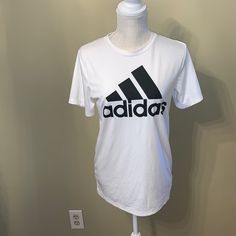 Adidas Tee Size L Kids 14-16 Great Condition Never Worn White Adidas Sporty T-shirt, Adidas White Sporty T-shirt, White Adidas Logo T-shirt For Sports, White Adidas Logo Sports T-shirt, Sporty White Tops With Text Print, White Adidas Logo Sports Top, White Adidas Sports Top With Logo, White Adidas Graphic Tee, White Adidas Sports Top