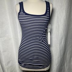 Size: Xs Color: White/Navy Stripes Condition: Nwt Material: 100% Cotton Cleaning Care: Machine Wash Warm, Tumble Dry Low. Navy Tank Top For Spring, Navy Fitted Summer Top, Fitted Navy Tank Top For Spring, Navy Cotton Tank Top For Spring, Cheap Striped Tank Tops, Cheap Striped Camisole Tank Top, Striped Cotton Spaghetti Strap Tank Top, Fitted Striped Sleeveless Tank Top, Blue Vertical Striped T-shirt For Summer