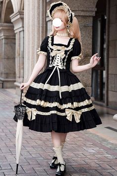 Fabric: Polyester Color: Black Collar: Square Collar Sleeve Length: Short Sleeves Feature: Multi-layer, Ruffle, Bowknot Style: Sweet Include: OP Dress*1 + Collar*1 (petticoat, detachable sleeves and bonnet are not included.) Size (IN) Bust Waist Sleeve Length Length Hem Width S 31.50-36.22 25.59-30.31 8.66 30.71 92.52 M 33.46-38.19 27.56-32.28 9.06 31.89 94.49 L 35.43-40.16 29.53-34.25 9.45 33.07 96.46 Size (CM) Bust Waist Sleeve Length Length Hem Width S 80-92 65-77 22 78 235 M 85-97 70-82 23 81 240 L 90-102 75-87 24 84 245 Op Dress, Spring Styles, Ribbon Dress, Uniform Fashion, Black And Beige, Sweet Lolita, Lolita Dress, Jumper Dress, Lolita Fashion